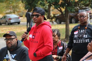 Anthony Taylor from Amp Connects speaks during the Black Healers Collective and the T/BRIC healing circle event at Tower Grove Park on Oct. 29. Both organizations are recipients of the St. Louis Regional Racial Healing + Justice Fund crisis response grant, which awarded funding to five organizations to help the community heal from the recent shooting at Central Visual and Performing Arts High School. Via St. Louis Public Radio